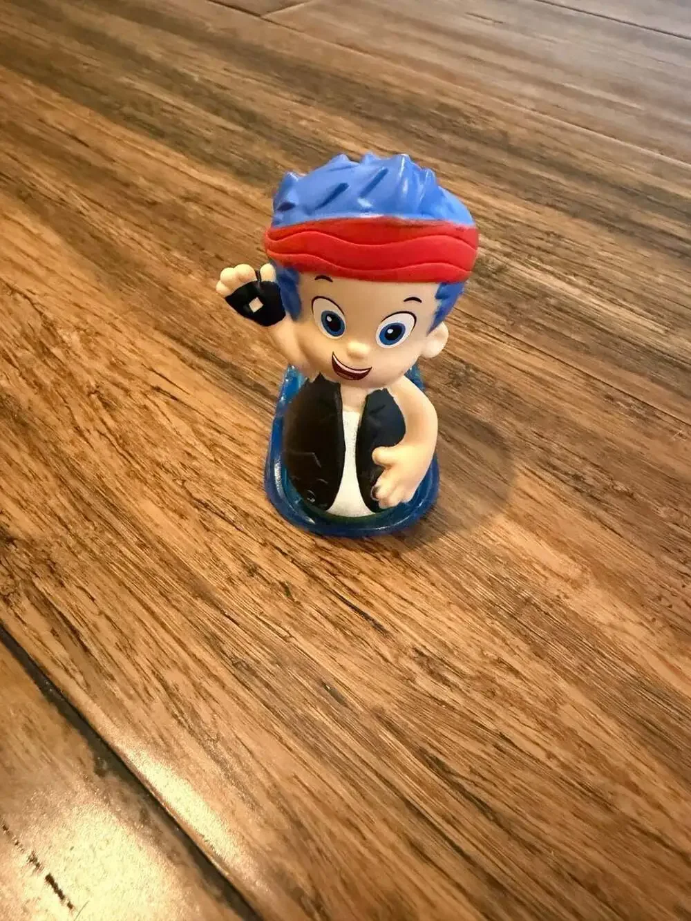 Fisher-Price Bubble Guppies Gil Rock and Roll Slider Figure